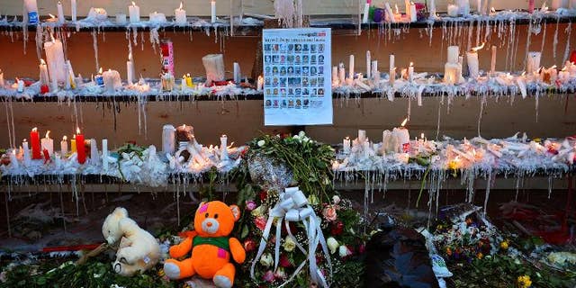 A list of victims is pictured outside the Westgate Mall on September 29, 2013 in Nairobi