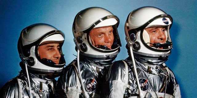 This May 1961 file photo shows astronauts, from left, Virgil I. Grissom, John Glenn and Alan Shepard. A new exhibit, "Heroes and Legends" is now at the Kennedy Space Center in Florida.