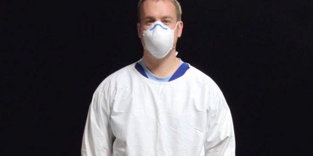 When it comes to preventing flu spread, especially during a pandemic, wearing face masks like this one could be medically and economically effective.