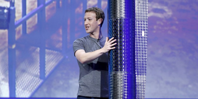 File photo: Facebook CEO Mark Zuckerberg holds a propeller pod of the solar-powered Aquila drone on stage during a keynote at the Facebook F8 conference in San Francisco, California April 12, 2016. (REUTERS/Stephen Lam)