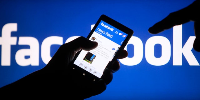 May 2, 2013: A smartphone user shows the Facebook application on his phone in the central Bosnian town of Zenica.