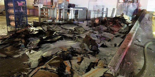 In order to prevent any further fires from starting for the same reason, officials explained that fire teams decided to drench any and all remaining crates.
