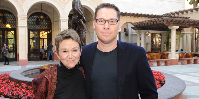 Octobre 14, 2013: University of Southern California School of Cinematic Arts Dean Elizabeth Daley and director Bryan Singer after the school renamed its Critical Studies Division after the director