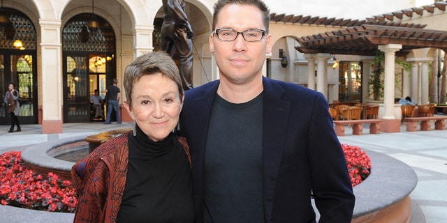 Octobre 14, 2013: University of Southern California School of Cinematic Arts Dean Elizabeth Daley and director Bryan Singer after the school renamed its Critical Studies Division after the director