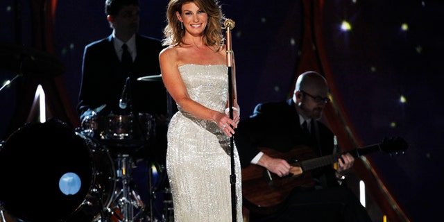 Singer, actress and mom of three with husband of nearly two decades Tim McGraw. The "Breathe" singer made a surprise performance with her hubby at the 49th ACMs and not only captivated the audience, but caught McGraws eye as well. Great fun singing with my wife last night! he tweeted. Seeing Faith walk out in that dress for the 1st time took my breath away. Hard to recover." The feelings mutual Tim.