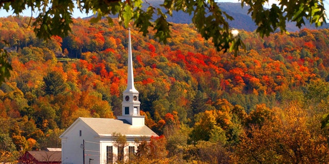 The early fall foliage frames the Stowe Community Church in Stowe, Vt., Tuesday, Oct. 5, 2004.
