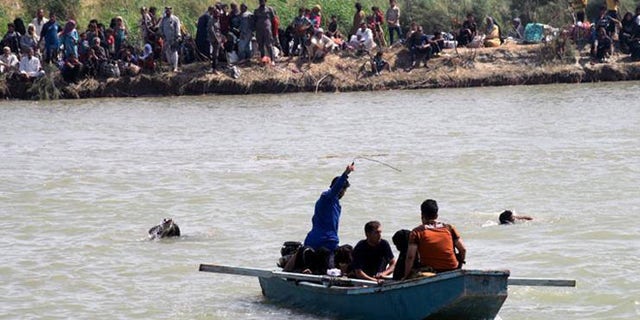 Several residents have died fleeing Fallujah on boats and rafts, in a dangerous crossing of the Euphrates.