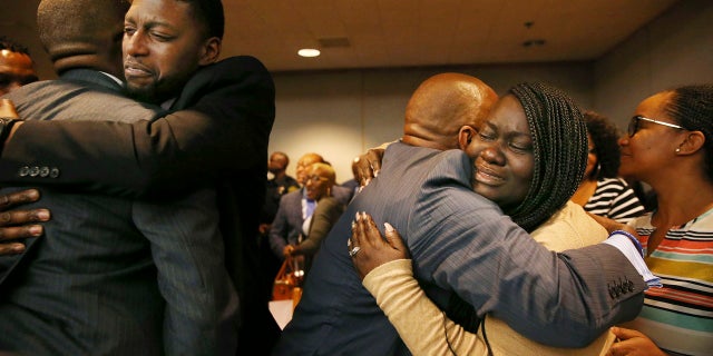 Odell Edwards and Charmaine Edwards, parents of Jordan Edwards, react to a guilty of murder verdict during a trial of fired Balch Springs police officer Roy Oliver.