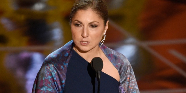 Anousheh Ansari accepts the award for best foreign language film for "The Salesman" on behalf of Asghar Farhadi at the Oscars on Sunday, Feb. 26, 2017, at the Dolby Theatre in Los Angeles. (Photo by Chris Pizzello/Invision/AP)