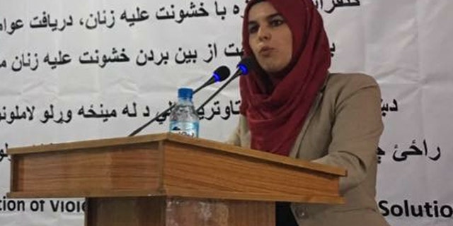Fariha Easar speaking at a conference in Kabul