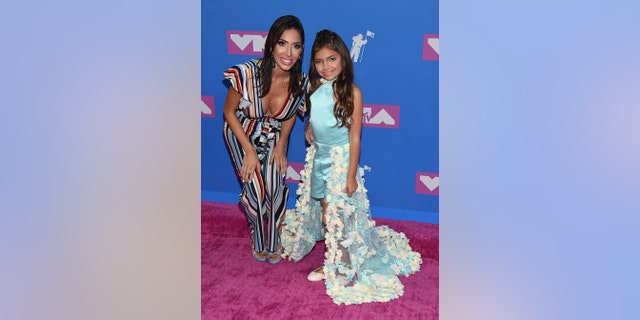 Farrah Abraham, left, and Sophia Laurent Abraham arrive at the MTV Video Music Awards at Radio City Music Hall on Monday, Aug. 20, 2018, in New York.