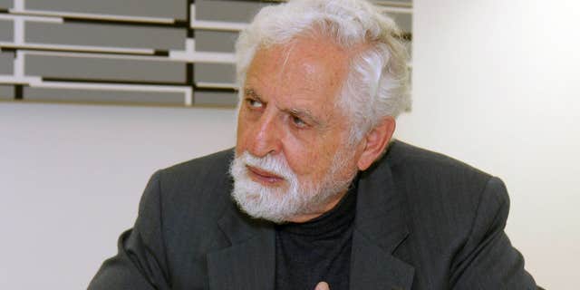 Oct. 20, 2009: Carl Djerassi talks to Austrian Chancellor Werner Faymann, not seen, at the federal chancellery in Vienna, Austria.