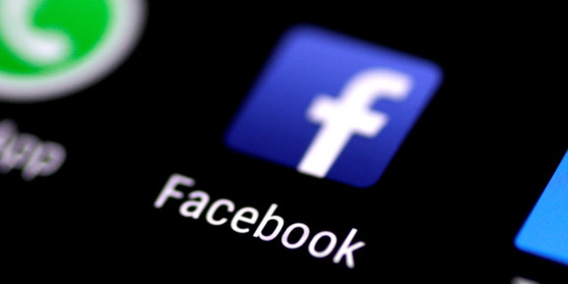The Facebook application is seen on a phone screen August 3, 2017. REUTERS/Thomas White - RC13B0FC4740