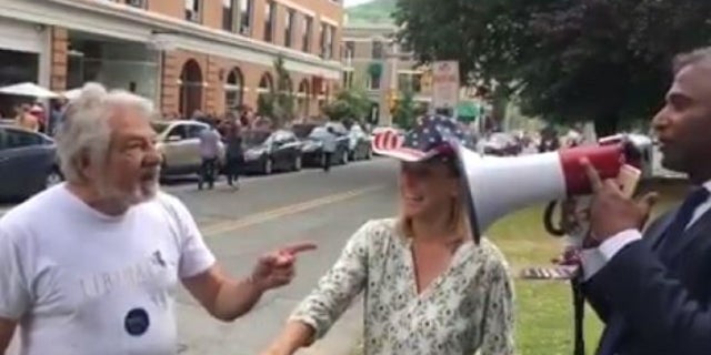 An Elizabeth Warren supporter, identified as Paul Solovay, 74, left, was arrested and charged with assault after he allegedly struck Senate candidate Shiva Ayyadurai, right, authorities said.