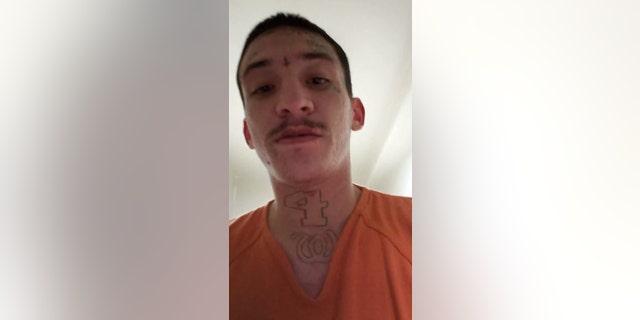 Joseph Chavez, 22, records a Facebook Live video inside his jail pod in Jefferson County, Colo., on Thursday.