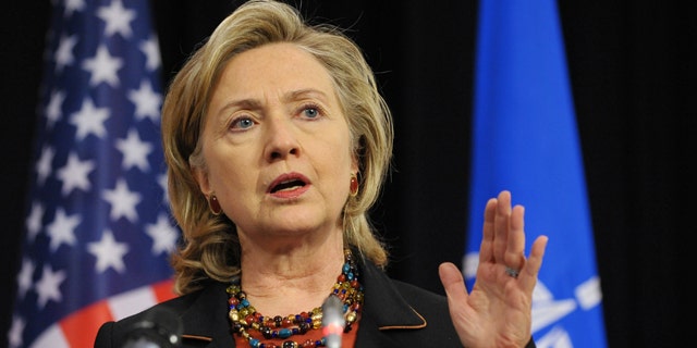 Oct. 14, 2010: US Secretary of State Hillary Clinton speaks during a joint press conference with Defense Secretary Robert Gates, at NATO Headquarters in Brussels.