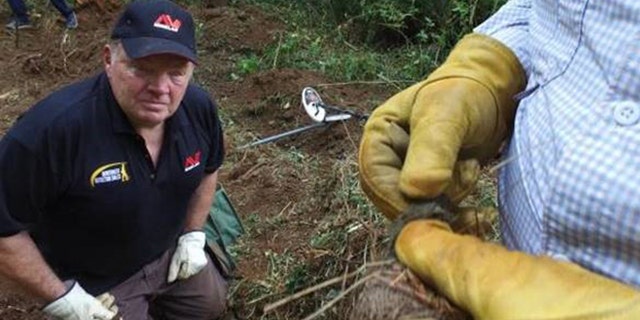 former FBI Supervisor Hadley McCann studied the nylon strap after it was found by former Vietnam Marine Jim Erwin.