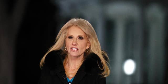 Counselor to President Donald Trump Kellyanne Conway speaks during a television interview with the White House in the background, in Washington, Thursday, Feb. 9, 2017, about the Federal appeals court refusal to reinstate President Donald Trump's travel ban. (AP Photo/Carolyn Kaster)