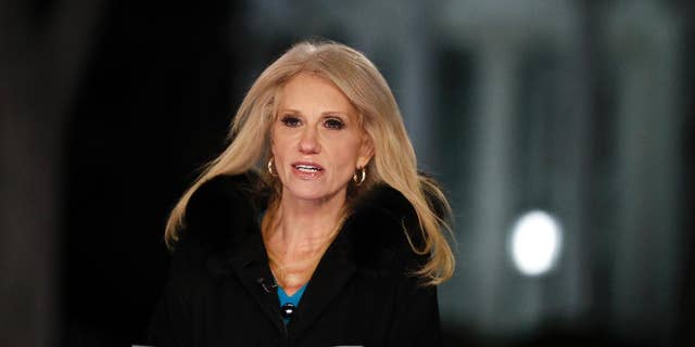 Counselor to President Donald Trump Kellyanne Conway speaks during a television interview with the White House in the background, in Washington, Thursday, Feb. 9, 2017, about the Federal appeals court refusal to reinstate President Donald Trump's travel ban. (AP Photo/Carolyn Kaster)