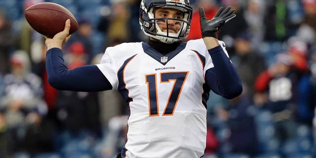 FILE - In a Nov. 2, 2014, file photo Denver Broncos quarterback Brock Osweiler warms up before an NFL football game against the New England Patriots in Foxborough, Mass. Osweiler has waited patiently as Peyton Manning's backup for 2 ½ years. He was disappointed on Sunday, Nov. 9, 2014, when he was all warmed up and ready to go in the game only to see the five-time MVP trot back onto the field. (AP Photo/Steven Senne)