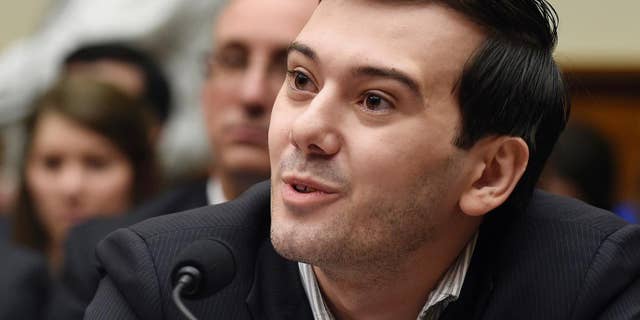 FILE - In this Feb. 4, 2016 file photo, pharmaceutical chief Martin Shkreli speaks on Capitol Hill in Washington during the House Committee on Oversight and Reform Committee hearing on a decision by his former company, Turing Pharmaceuticals, to significantly raise the price of the anti-parasitic medication Daraprim. Heated protests at the University of California, Davis brought the cancellation of planned speeches by far-right commentator Milo Yiannopoulos and former pharmaceutical executive Shkreli shortly before the event was to begin. University police put up barricades as protesters shouting "shut it down" grew increasingly rowdy in the hours leading up to the talks on Friday night, Jan. 13, 2017. (AP Photo/Susan Walsh, File)