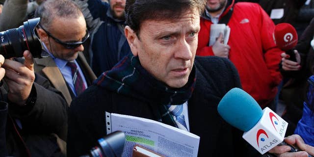 FILE - In this Monday, Jan. 28, 2013 file photo, Doctor Eufemiano Fuentes arrives at a court house in Madrid, Spain. A court was set to rule Tuesday June 14, 2016, on whether hundreds of blood bags that are key evidence in one of Spain's worst doping scandals should be destroyed or handed over to authorities for investigation. (AP Photo/Andres Kudacki, File)