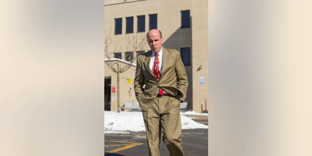 FILE - In this Feb. 5, 2015, file photo, Calvin Harris walks out of the Schoharie County Courthouse after the Tioga County district attorney made his opening statement in his third trial in Schoharie, N.Y. For the fourth time since Michele Harris disappeared in 2001, her estranged husband Harris will go on trial for murder in upstate New York. Jury selection on the latest trial starts Monday, March 28, 2016. (Simon Wheeler/The Journal via AP, File) NO SALES; MANDATORY
