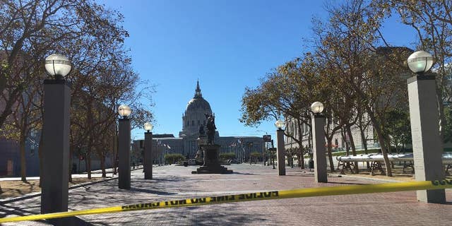 Police in San Francisco have blocked off traffic around Civic Center and United Nations Plaza after receiving reports of a man who might be armed, Saturday, Sept. 24, 2016. KGO-TV said Saturday that pedestrians and motorists are being asked to leave the area amid reports of a man holding up something that may be a weapon.