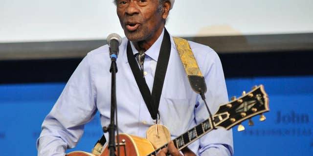 FILE - In this Feb. 26, 2012 file photo, rock 'n' roll legend Chuck Berry performs "Johnny B. Goode" at the John F. Kennedy Presidential Library and Museum in Boston. Berry is set to release his first new studio album in more than 35 years. The album, titled "Chuck," will be available in 2017. (AP Photo/Josh Reynolds, File)