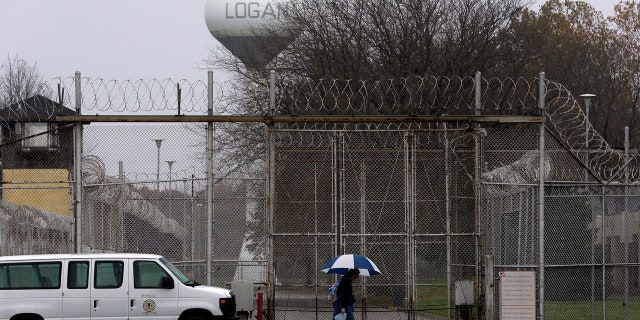 Security fences surround the Logan Correctional Center Friday, Nov. 18, 2016, in Lincoln, Ill. Inmates at Illinois' main prison for women are demeaned as "crazy" and "worthless" by staff in a facility that offers little help to prepare women to re-enter the community, a study to be released Friday found.