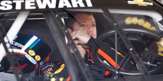 Tony Stewart prepares to go out onto the track during practice for the NASCAR Daytona 500 Sprint Cup Series auto race at Daytona International Speedway, Saturday, Feb. 16, 2013, in Daytona Beach, Fla. (AP Photo/Terry Renna)