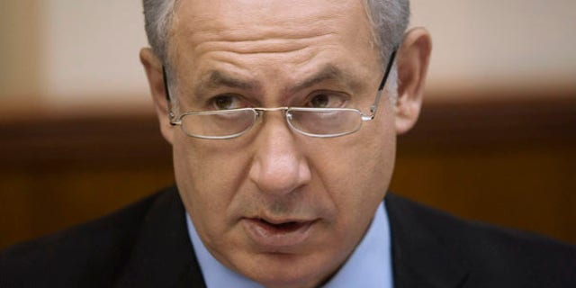 Israeli Prime Minister Benjamin Netanyahu, speaks during the weekly cabinet meeting at his Jerusalem office, Sunday, June. 27, 2010. (AP Photos/Dan Balilty, Pool)