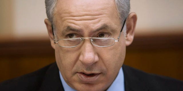 Israeli Prime Minister Benjamin Netanyahu, speaks during the weekly cabinet meeting at his Jerusalem office, Sunday, June. 27, 2010. (AP Photos/Dan Balilty, Pool)