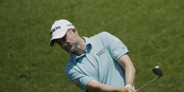 Russell Knox chips onto the second green during the third round of The Players Championship golf tournament Saturday, May 14, 2016, in Ponte Vedra Beach, Fla. (AP Photo/Chris O'Meara)
