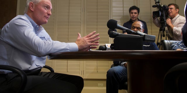 Pilot Flying J CEO Jimmy Haslam speaks to the media during a news conference at the Pilot Flying J headquarters Tuesday, April 16, 2013, in Knoxville, Tenn. Haslam said FBI and IRS raid Monday on the company was part of a federal criminal investigation into claims of failure to pay rebates to trucking customers. (AP Photo/Knoxville News Sentinel, J. Miles Cary)