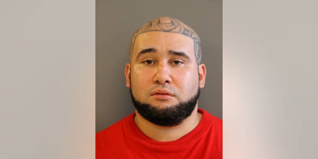 This undated photo provided by in the Chicago Police Department shows Paul Pagan. Chicago police said Monday, Sept. 26, 2016 they've charged Pagan, an alleged gang member, with murder in the slaying of a man who was shot last weekend near Millennium Park, a popular downtown tourist attraction. (Chicago Police Department via AP)