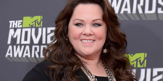 Actress Melissa McCarthy arrives at the 2013 MTV Movie Awards in Culver City, California April 14, 2013.