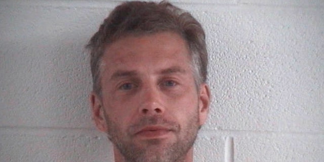 This photo provided by Ashland County Sheriff Office shows Shawn M. Grate.   Grate, was arrested Tuesday, Sept. 13, 2016, in Ashland, Ohio in connection to the investigation of a rescued abductee and the discovery of the remains of two people in the home where he was arrested. (Ashland County Sheriff Office /The Times Gazette via AP)
