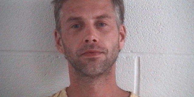 This photo provided by Ashland County Sheriff Office shows Shawn M. Grate. Grate, was arrested Tuesday, Sept. 13, 2016, in Ashland, Ohio in connection to the investigation of a rescued abductee and the discovery of the remains of two people in the home where he was arrested. (Ashland County Sheriff Office /The Times Gazette via AP)