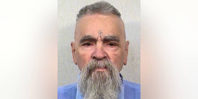 FILE - This Oct. 8, 2014 file photo provided by the California Department of Corrections and Rehabilitation shows serial killer Charles Manson. California prison official says cult killer Manson is alive following reports that he was hospitalized on Tuesday, Jan. 3, 2017. (California Department of Corrections and Rehabilitation via AP, File)