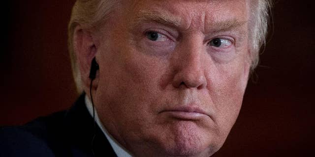 President Donald Trump listens as Italian Prime Minister Paolo Gentiloni speaks during a news conference in the East Room of the White House in Washington, Thursday, April 20, 2017. (AP Photo/Andrew Harnik)