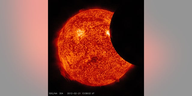 A partial solar eclipse, as observed by NASA's Solar Dynamics Observatory in February 2012.