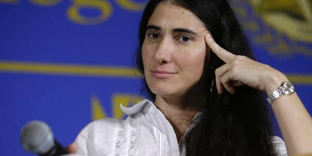 FILE - In this April 1, 2013 file photo, Cuba’s best-known blogger Yoani Sanchez speaks at the Freedom Tower of Miami Dade College, in Miami, Florida. Sanchez said she will start publishing a general-interest newspaper online Wednesday, May 21, 2014, in a move that will test both the government’s openness to free expression and the dissident’s ability to build a following inside her country. (AP Photo/Lynne Sladky, File)