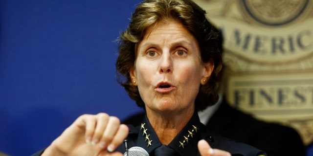 FILE - In this Sept. 9, 2015 file photo, San Diego Police Chief Shelley Zimmerman talks about the results of the first year of body cameras being worn by approximately 800 police officers in San Diego. Zimmerman is among the growing number of women heading departments, many in need of image makeovers. (AP Photo/Lenny Ignelzi, File)