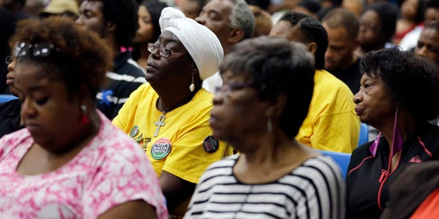 Sept. 24, 2014: Several hundred people pack a room on the St. Louis Community College Florissant Valley campus during a meeting held by the Department of Justice to talk about the agency's investigation of the Ferguson police department