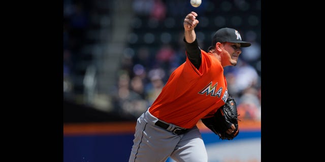 Miami Marlins starting pitcher Jose Fernandez pitches during the first inning of the baseball game against the New York Mets at CitiField Sunday April 7, 2013, in New York. (AP Photo/Seth Wenig)