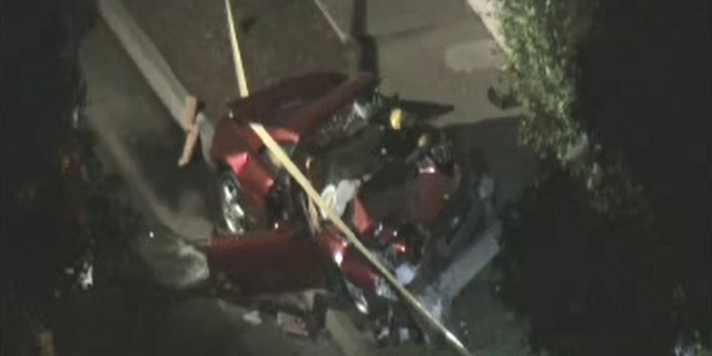 The Ferrari lost control and crashed into two vehicles before hitting a tree Tuesday night, officials said.