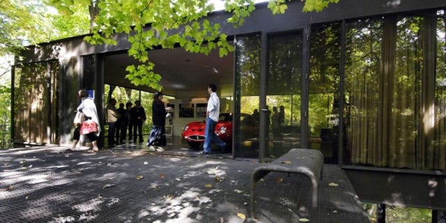 Visitors tour the pavilion in the back of the modernist home in Highland Park, Ill., that was featured in the movie “Ferris Bueller’s Day Off.”