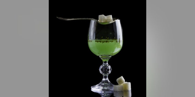 Absinthe glass with lump sugar