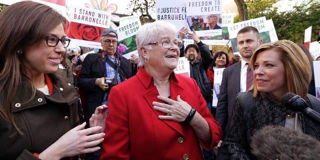 Barronelle Stutzman, center, on Tuesday.